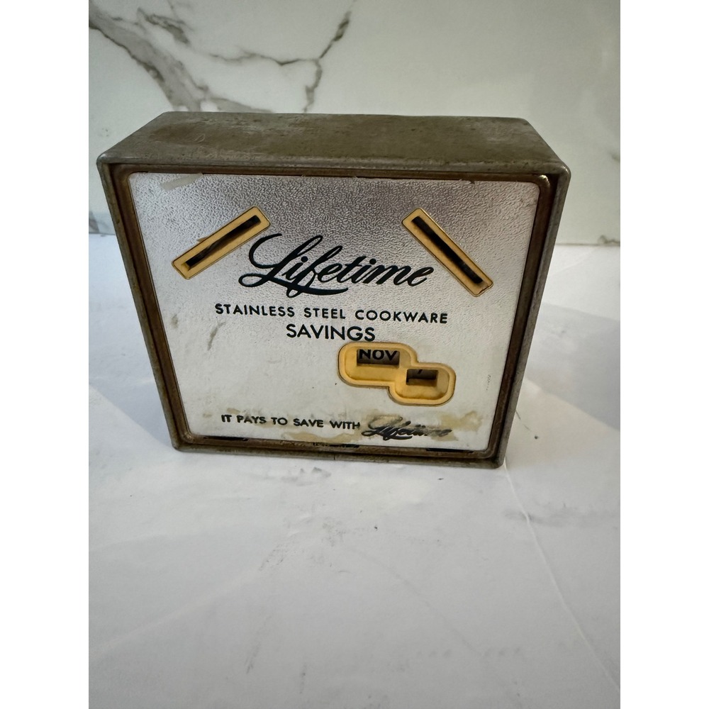 Vintage Lifetime Stainless Steel Cookware Savings Metal Coin Bank Calendar